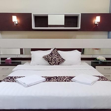Hotel Pilar Mosa Muarawahau Bagian luar foto