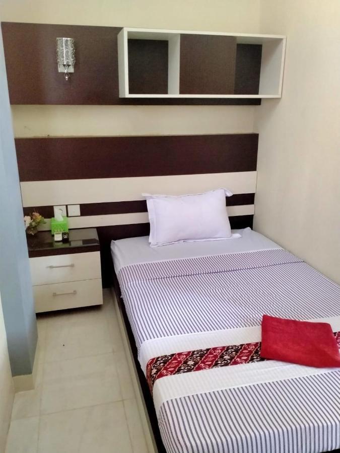 Hotel Pilar Mosa Muarawahau Bagian luar foto