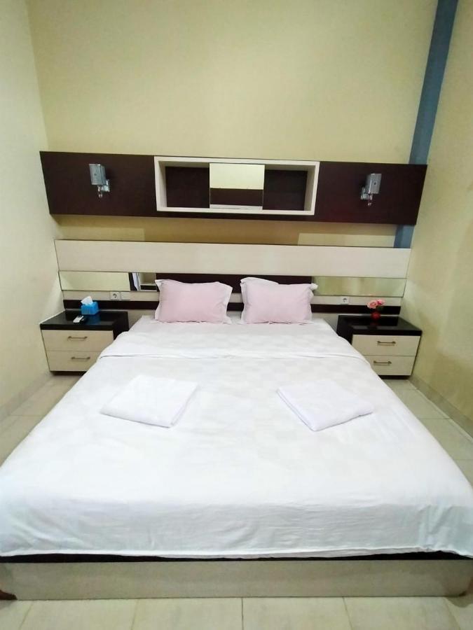 Hotel Pilar Mosa Muarawahau Bagian luar foto