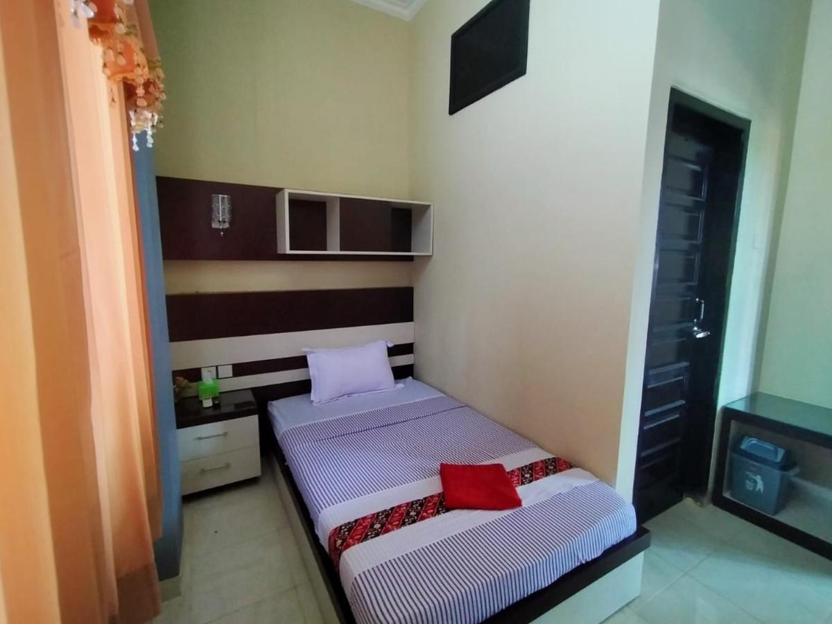 Hotel Pilar Mosa Muarawahau Bagian luar foto