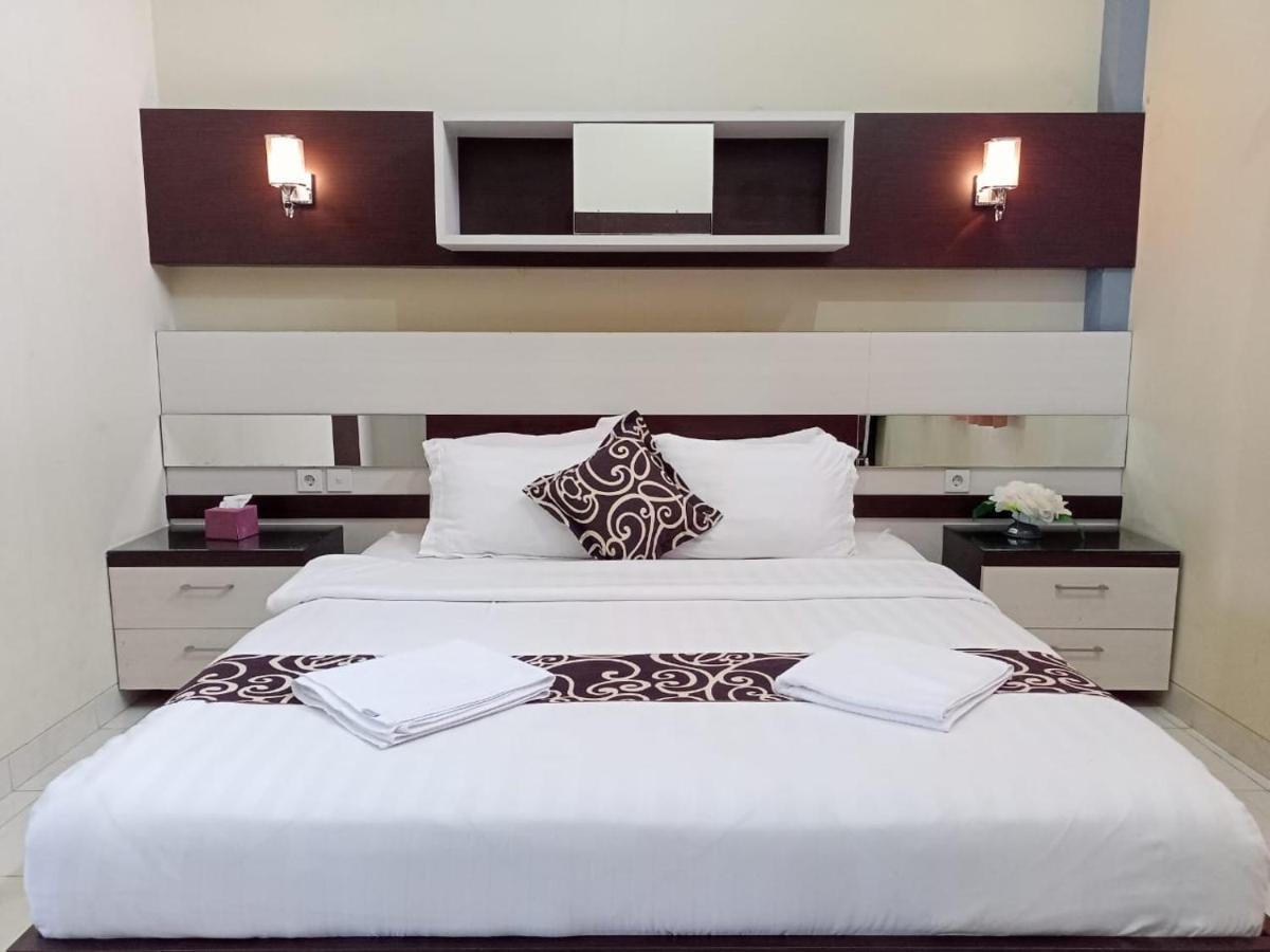 Hotel Pilar Mosa Muarawahau Bagian luar foto